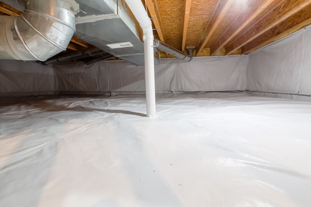 How a Crawl Space Vapor Barrier Protects Your Home From Moisture Damage